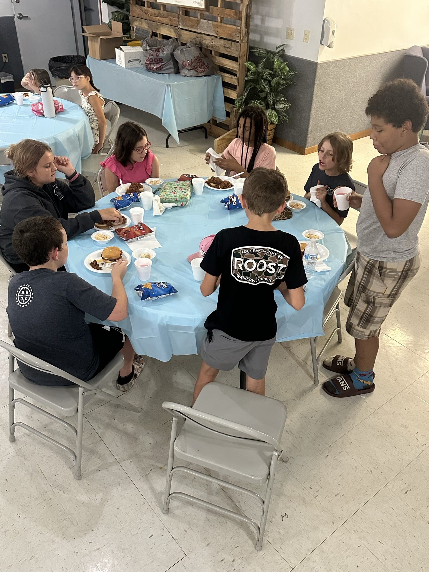 Hardeetown students sharing a meal together around the table